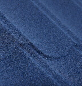 Bright Blue stone coated metal roof tile close-up